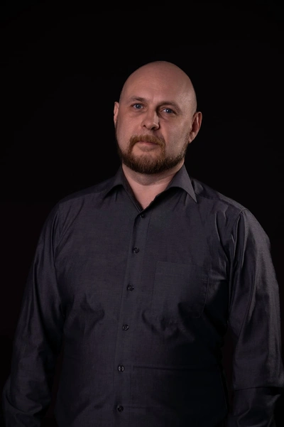 Олег Плакатин